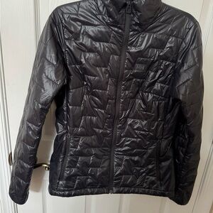 NWOT Helly Hansen packable insulated jacket. Never worn. Excellent  condition.